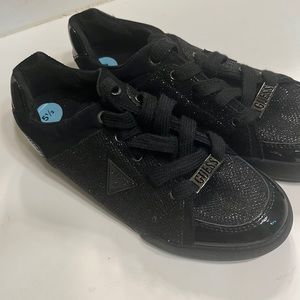 These are black guess shoes for kids an teens.!
